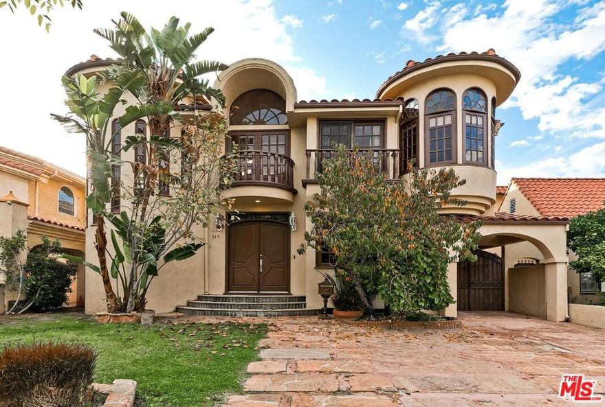 Magnificent and voluminous 2sty Contemporary Mediterranean in a most coveted location on a quiet Beverly Hills road just south of Wilshire and moments to all of the finest amenities. From the moment you enter, the open floor plan exhibits super high ceilings (some beamed and others with Art Deco influences), exquisite marble and dark wood floors, and French doors. Huge Great room with entertainer's bar leads to the rear yard with attached pergola and extensive patio space. Lovely front den/office downstairs with powder room. Fabulous cook's kitchen with top appliances and large breakfast/dining area. Upstairs features 4 bedrooms with high vaulted ceilings and great natural light. Primary suite has a sitting area and luxe bath. The three rear-facing guest bedrooms upstairs each have Juliet balconies. An large elevated loft-style upstairs family room is another unique highlight of the home. Bonus/storage/laundry room of over 300SF is in the rear NW corner of the lot. Long-term only and amazing furniture can be included at a higher monthly rate.