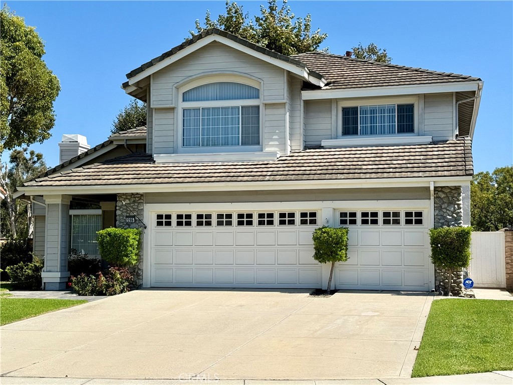 This outstanding two-story home in the highly sought-after River Ridge community offers over 3,300 square feet of beautifully updated living space, with 4 spacious bedrooms, 3 luxurious granite bathrooms, and multiple living areas that provide both comfort and versatility. Nestled on a 7,405 square foot lot and located on a cul-de-sac street, near the prestigious River Ridge Golf Club, this home combines elegance, functionality, and an unbeatable location. Step inside to a light-filled interior featuring a dramatic living room with soaring two-story ceilings -- perfect for gatherings or quiet evenings at home. The gourmet kitchen is a chef’s dream, complete with granite countertops, a center island, and stainless steel appliances including refrigerator, oven, stovetop and microwave. The open-concept design flows into a huge family room - ideal for entertaining or relaxed family living. The first floor bedroom has been converted to a home office with built-in shelves and two desks. Upstairs, you’ll find three large bedrooms and a second family room/bonus room with cathedral ceilings. The expansive primary suite is a true retreat with high ceilings, a balcony, and an oversized walk-in closet. The luxurious primary bath features granite countertops, dual sinks, a spa tub, and a large separate shower. Additional highlights include a well-appointed laundry room with granite counters, sink, and washer/dryer, as well as a massive 3-car garage and large driveway. Outside, enjoy a private fenced yard that backs to a greenbelt, a large patio for entertaining, and a built-in gas barbecue with center island. Residents of River Ridge enjoy access to premium community amenities including a sparkling pool, relaxing spa, greenbelts and tennis courts. Don’t miss the opportunity to lease this beautiful home in one of the area’s most desirable neighborhoods!