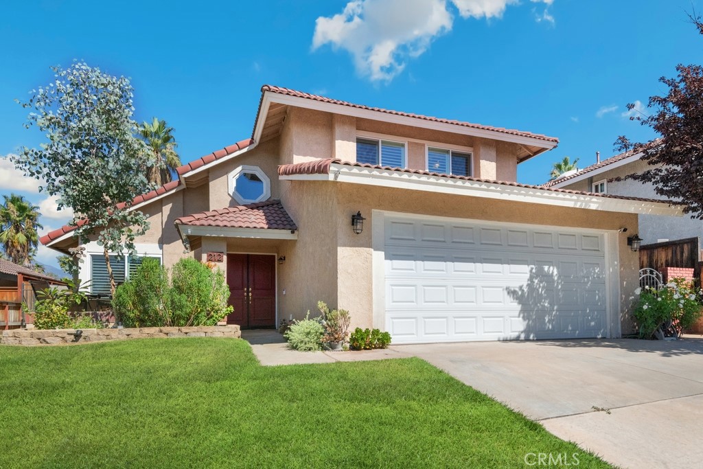 Welcome Home to this desirable Highland Grove Community! This charming home is not only beautifully updated but also comes with a PAID OFF SOLAR SYSTEM—a valuable bonus for energy efficiency and savings. Step inside and be greeted by the bright and airy ambiance of vaulted ceilings and a cozy fireplace in the living room. New windows, ceiling fans and shutters throughout. The formal dining area creates a warm and inviting space for family gatherings and entertaining. The light-filled, updated kitchen features sleek quartz countertops, modern stainless steel appliances, and easy-to-maintain tile flooring. The great room provides the perfect setting for movie nights with a built-in large movie screen, while sliding doors lead you to a covered patio, ideal for outdoor living and entertaining. Upstairs, you’ll find 3 spacious bedrooms and 2 updated bathrooms. The primary suite is a true retreat, complete with a generous walk-in closet and plenty of space to unwind after a long day. The backyard is an entertainer's paradise with a covered patio and a gazebo—perfect for hosting friends and family in comfort. The community offers fantastic amenities, including a park right across the street, pool and spa, tennis courts, a playground, and basketball courts. All of this is just minutes from beautiful downtown Redlands, top-rated schools, the University of Redlands, and easy access to the freeway. Come see for yourself why this home is the perfect blend of comfort, style, and convenience!
