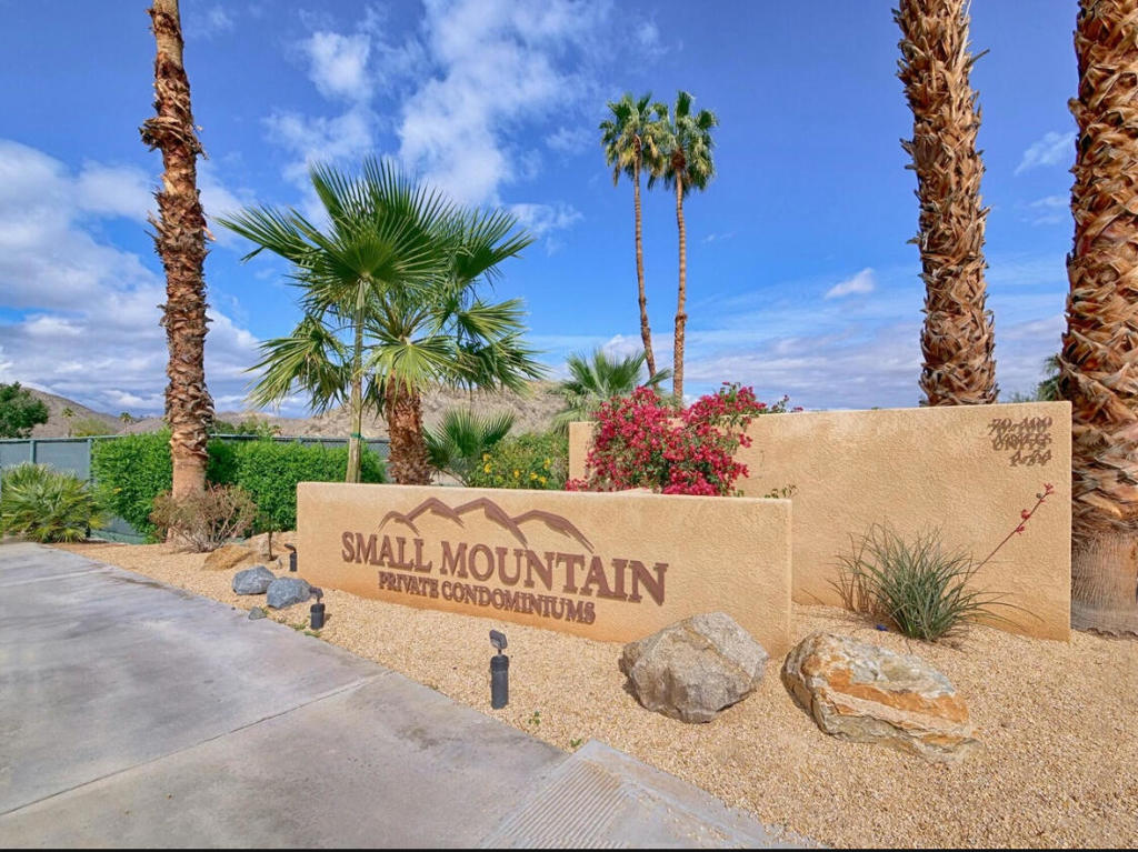 Welcome to Unit 62 in the exclusive Small Mountain community of Rancho Mirage. This highly upgraded, single-level end unit offers a rare opportunity to own in a 70-unit development known for privacy, minimal turnover, and rising values.The open-concept interior features eco-conscious countertops made of recycled paper, paired with chef-grade appliances: FORNO Galliano 5-burner range, Viking Professional fridge, ZLINE dishwasher, Hoshizaki ice maker, and Ruvani stainless sink w/ integrated accessories. Recent upgrades include a 4-ton Amana HVAC system and new water heater, HVAC redistribution in the kitchen/great room, and LED lighting throughout.The primary suite includes dual walk-in closets with custom organizers, a private HVAC zone, remodeled ensuite, and a brand-new coffee bar. The guest suite bath was remodeled in 2024. Space-saving barn doors and single-lite glass doors enhance the home's open feel. New zebra shades and blackout window treatments ensure comfort.Step outside to a private ~380 SF backyard patio, perfect for relaxing or entertaining. The space features a mature, up-lit privacy hedge (recently trimmed to capture stunning mountain views), an automated drip irrigation system, a permanent adjustable shade structure with extra shade panels included, and a brand-new 4-person spa/cold plunge. Also included are a new outdoor electric heater, a new canopy replacement, a full-length misting system, LED landscape lighting, a designated pet potty area, and convenient outdoor storage. The seller will include the new canopy and electric heater with the sale of the property.Small Mountain features recent ADA upgrades, healthy HOA reserves, annual roof maintenance, low rental saturation, and no current assessments. Located adjacent to the pool/spa/mailboxes for convenience.Enjoy walkable access to dining and coffee shops like KOBE, Willie's, Catalan, Foxy's, and Rancho Mirage Coffee. Just 2 miles to Eisenhower Medical Center. Rancho Mirage residents enjoy free ambulance services and library/planetarium access.Don't miss this turn-key, eco-friendly desert retreat.Call today to set up your private tour.