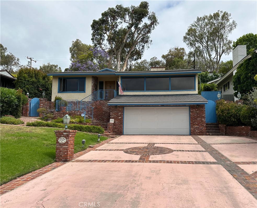Opportunity awaits in this Prime Valmonte Location! Reimagine 2737 Via Capay (AKA PV Drive N) and build your dream home in one of the most coveted neighborhoods of Palos Verdes Estates. 2737 Via Capay offers the chance to create a personalized residence with unobstructed views and enduring value. Located at the desirable and private west end of the Valmonte corridor, Via Capay is just minutes from the charm of Malaga Cove Plaza and the coastal allure of the Hollywood Riviera, beaches, shopping and more. The existing home spans 1,937 square feet on a generous 7,829 square foot lot. With 3 bedrooms and 2 bathrooms, the property is set on a south-facing slope that captures sweeping views of the Valmonte Dunes and the Palos Verdes hillside - visible from both the interior and the elevated rear deck. The house has a new roof, furnace and water heater. Refinished hardwood floors and new carpet. there is a separate laundry room off of the large 2-car garage and ample storage. Although the property needs updating, with vision and a desire to build something truly special, this setting is hard to replicate.
