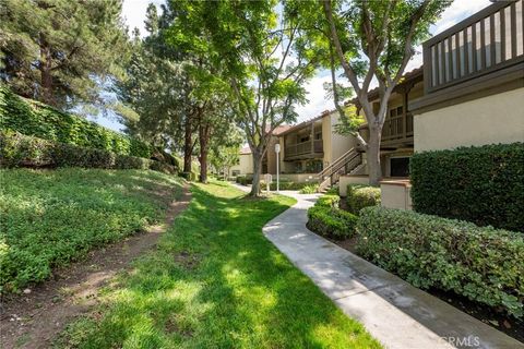 Photo of 215 S Cross Creek Rd #L, Orange, CA 92869 (MLS # PW26108272)