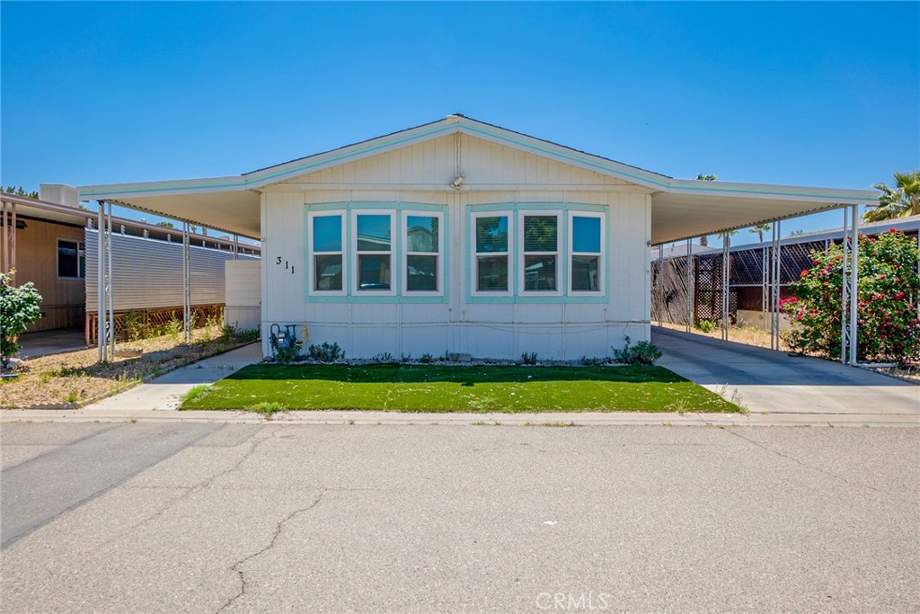 *****Price Improvement – Now Even More Attractive! *****
We’ve listened to the market and adjusted the price to create a more compelling opportunity for buyers. This home is now priced to sell.
****All-Age Community | Spacious Layout | Bonus Room!****
Welcome to 15252 Seneca Rd #311—a beautifully maintained home offering an open, flexible floorplan with 3 spacious bedrooms, 2 full bathrooms, and a large bonus fully enclosed patio that can easily be used as a hobby space, entertainment area.
With 1,440 sq ft of well-designed living space, this home features:
• Dark wood laminate flooring with reinforced subfloors
• Cozy carpeted bedrooms
• Ceiling fans and central air and heat for year-round comfort
• Inside laundry room for added convenience
• 10x10 matching shed and a fenced backyard for storage and privacy
• 2–3 car carport—plenty of room for parking
Community amenities include a pool, gym, basketball and tennis courts, and an entertainment room, offering something for everyone.
Great value in a highly sought-after all-age park—don’t miss your chance to make this one yours!
**** Please note: All buyers must be approved by the park. ****
The refrigerator (2 yrs old) and Dryer (3 years old) are available to buy separately.
