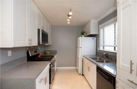 Photo of 6912 Remmet Avenue #5, Canoga Park, CA 91303 (MLS # IV26011999)