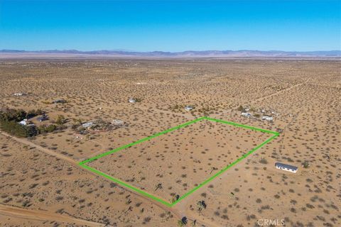 Photo of 1631 Alta Avenue, Landers, CA 92285 (MLS # JT26029491)