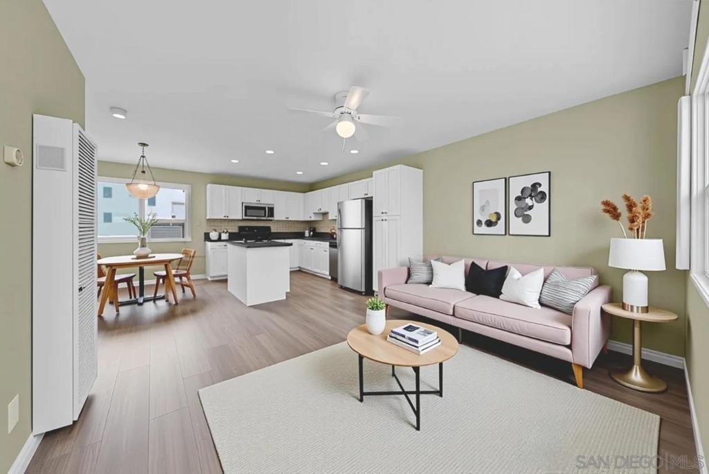 Welcome to 3565 Highland Ave Unit 5, a beautifully updated 1 bedroom, 1 bath nestled in the heart of San Diego's City Heights neighborhood. This bright and stylish unit features vinyl plank flooring, an open-concept living space, and a modern kitchen complete with a central island—perfect for cooking and entertaining. Enjoy the comfort of ceiling fans in key areas, bringing in a cool breeze throughout the day. The home offers two designated parking spaces, including one private garage space. Located in an excellent, central location, you're just minutes from major freeway access, making commuting a breeze while still being close to local dining, shops, parks, and more. This move-in-ready home offers the perfect blend of comfort and convenience —ideal for first-time buyers or savvy investors alike. Don't miss this opportunity to own in one of San Diego’s most accessible neighborhoods. Please note some photos are virtually staged.