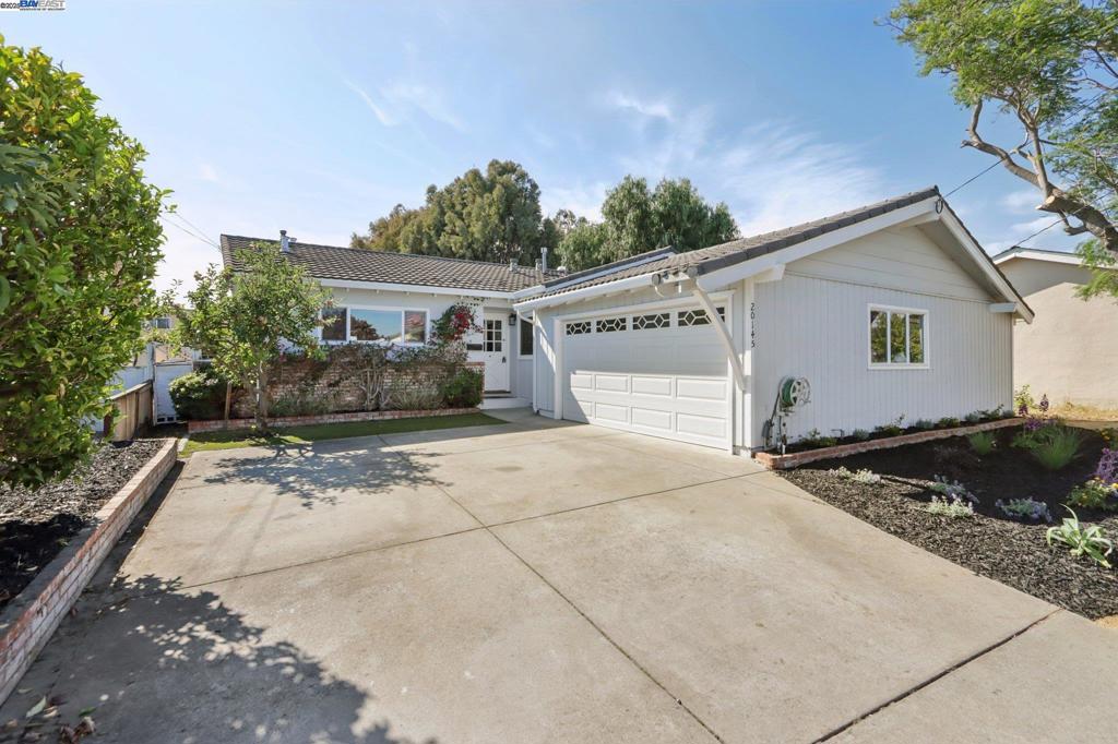This inviting 3-bedroom, 2-bath home with 1,443 sq. ft. of living space and a 2-car garage comes complete with owned solar panels to help lower energy costs. The freshly painted interior offers a spacious family room with a fireplace and sliding doors that open to the backyard. The kitchen includes a dining area and convenient access to the garage with ample storage. The primary suite features a closet and private bath with a stall shower, while two additional bedrooms and a hall bath complete the layout. The backyard with lawn area is ideal for entertaining, gardening, or play. Centrally located near freeways, transit, schools, shopping, and more, this home blends comfort, convenience, and efficiency. Don’t miss this one!