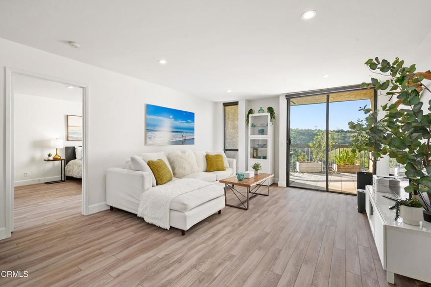 Large patio with stunning views. Natural sunlight throughout the day in all rooms. Excellent floor plan with a two split primary suite layout. Granite counter top in kitchen, and lots of cabinets. Laundry hook-ups inside the unit. No steps to go to the unit from the street.