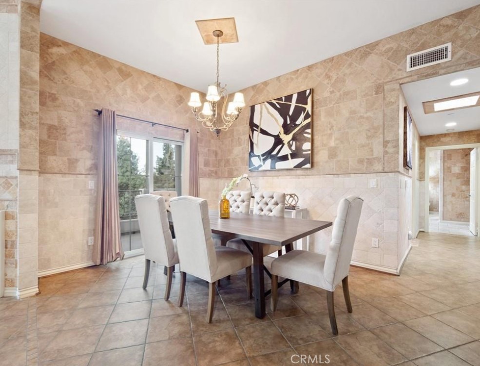 Welcome to Tuscany! This one-of-a-kind Italian-inspired Penthouse offers 2 bedrooms and 2.5 baths, all on a single level with soaring cathedral ceilings. Enjoy breathtaking, unobstructed greenery views from every angle, complete with two private big balconies. This residence offers unmatched privacy. The entertainer’s kitchen features stainless steel appliances and granite countertops, perfect for hosting. Additional highlights include a gated two-car garage, and a prime Studio City location just steps from Ventura Blvd. Enjoy the weekly farmers market, nearby parks, Equinox, Erewhon and top-rated Carpenter School. Built in 2002. HOA is only$665.