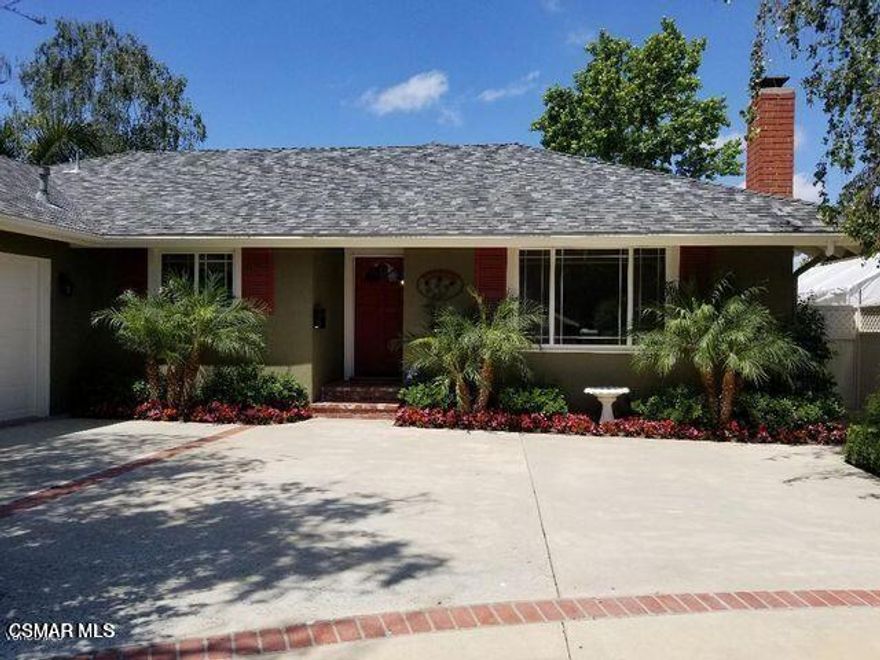 This stunning and unique one of a kind single story 3 bedroom 2 bath home has been exquisitely upgraded. From the cheery, vibrant kitchen and dining area to the sensational backyard. Floors have original pine and white oak flooring throughout. The 2 car garage has been converted into a spectacular bonus room with Italian hand painted patchwork tile flooring. French doors off the kitchen lead to a romantic deck with beautiful hill and mountain views. The backyard has fruit trees galore, lemons, limes and oranges just to name a few. There is crown moulding throughout the home. All doors have been individually upgraded. The master retreat has beautiful wood beamed ceilings, a cozy window seat and a large walk in cedar lined closet. Home includes a tankless water heater and reverse osmosis hot and cold filtered water system. There is a special little playroom for the kids to enjoy with its own separate entrance off the backyard that includes a full wall chalkboard, sure to keep your little ones busy for hours.  Come and see this home before it's gone.