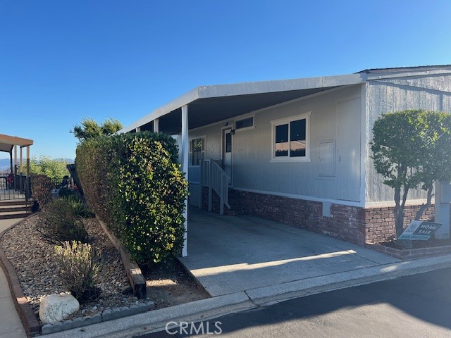 This home has amazing views.This 2 Bedroom and 2 Bathroom home has incredible views, that would be enough, but this home has so much more. Enjoy this Charming Manufactured Home, peaceful serenity overlooking the San Fernando Valley in West Hills, high above the noise with majestic views. Private, Gated Community, nestled up in the mountains in a very scenic setting, very tranquil and lovely. Breathtaking views from inside and outside the Home. This home has has been recently updated with new flooring through out, new kitchen with all new appliances and new updated bathrooms. This is a must see.