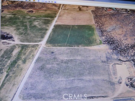 Quiet and peaceful 9.66 Acres Land, feels like country living but 5-10 minutes from the center of Hemet. Perfect for building custom house, ranch or farm.
The lot is almost flat and has a good dirt road (Cora Lee) running down the west edge of the property and another road on the south edge. Prime opportunity. You can go look any time. Take State Street, to Diamond Valley Road, turn left on Cora Lee, go over the small hill and there it is on your left hand side just before the tree line.