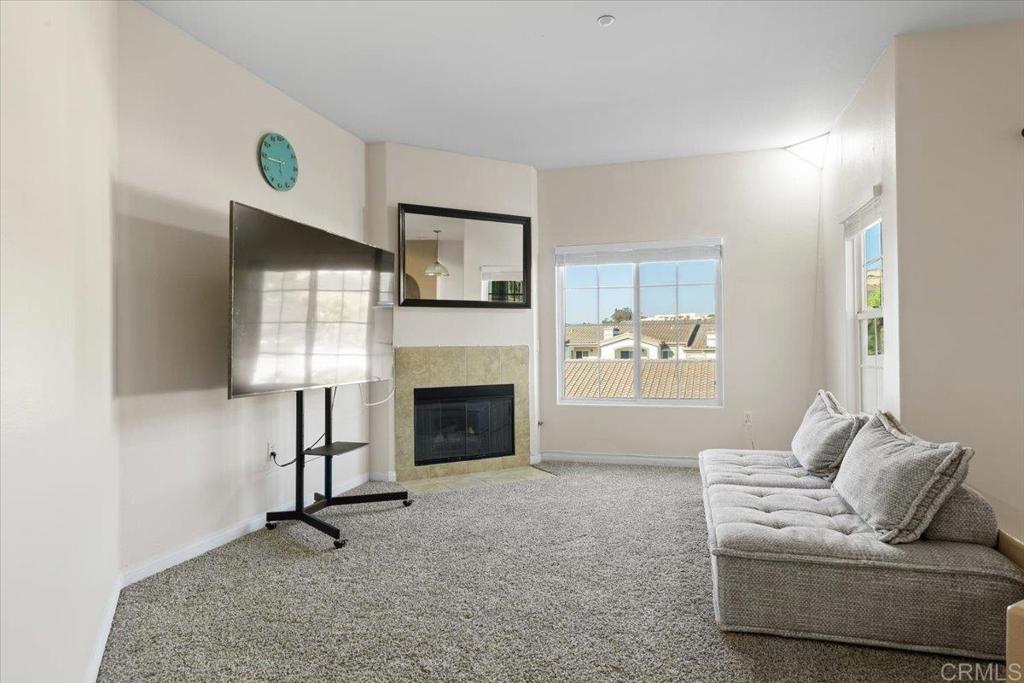 Low-Rate VA Assumable Loan - subject to approval. Are you looking for a single-car garage, covered parking, a dedicated yard space, a balcony, pool, and the peace of mind of a gated community? This one has it all! This beautifully maintained 2-bedroom, 2-bath condo features a desirable split-bedroom layout, perfect for added privacy. The spacious primary suite includes a large ensuite bathroom with a relaxing soaking tub and shower combo. Freshly installed carpet and new touch-up paint make this unit completely move-in ready. Located on the second floor with tall ceilings and an open-concept floor plan, this home feels bright, airy, and inviting. You will enjoy great perks like double sinks in the bathroom, a private balcony for your morning coffee, and access to resort-style amenities including a sparkling pool, jacuzzi, and secure gated entry. With a low HOA, FHA and VA approval, and a strong, well-kept community, this condo is an incredible value—ideal for first-time buyers, downsizers, or investors. Don't miss out, call your REALTOR® today!