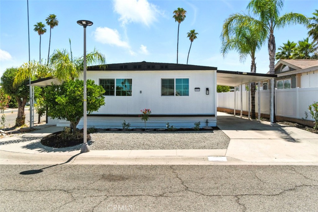 Sierra Dawn senior community, 55+ and over low taxes, low association. Great price for this beautiful renovated manufacture on land 3 bedrooms, 2 bathrooms, and huge bonus room for multiple uses more bedrooms, sawing, or art room etc. Brand new heating and air, new roof, freshly painted inside and outside, new kitchen cabinets self closing with modern hardware handles, brand new appliances black and stainless steal, quartz counter tops, new stainless steal sink, new black faucet, new laminated flooring, new recessed lights, all new light fixtures inside and out, dinning area with a bar, new toilets, new faucets on bathroom vanities. new back fence very private, landscaping for easy maintenance. can be shown any time don't miss this opportunity. Thank you for showing it!!