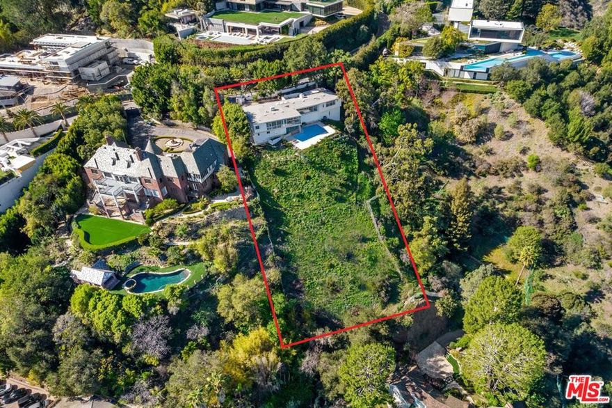 Set on one of the last promontories available in prime Bel Air Road and surrounded by $50M-$100M estates, this investment is a once-in-a-lifetime opportunity that offers the most explosive views in the city. Front row with plans from world-renowned SAOTA Architecture to build a 16,000 SF organic modern masterpiece that will be worth well over $80M when complete. Situated at the 50 yard line of Bel-Air and Beverly Hills, just minutes from Hotel Bel-Air and the best dining, entertainment & shopping that Los Angeles has to offer.