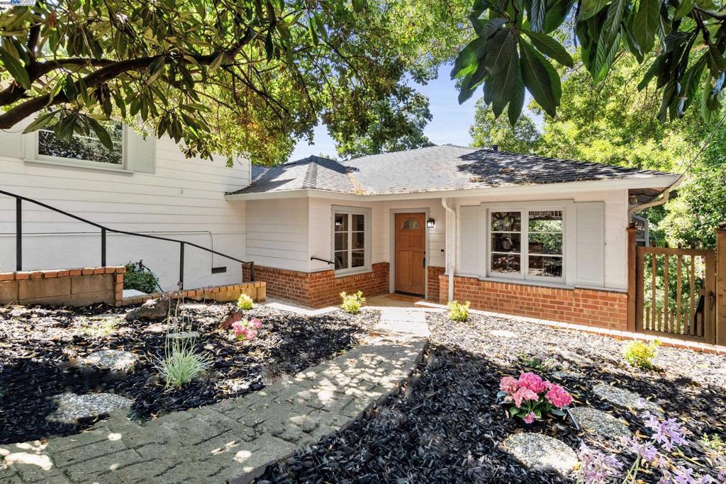 Tucked into the scenic Hills of Montclair, this home offers the perfect blend of space, comfort and a prime Oakland location with 4 bedrooms, 2 1/2 baths and over 2100 ft.². All main living areas are on one level, making the expansive downstairs perfect for a great room or a private retreat to the fourth bedroom. The home features a new roof, a freshly professionally painted interior, and ample storage throughout. The oversized windows bring lots of natural light and frame the beautiful views of the surrounding greenery. Just minutes to the village for local shops, cafés, the weekly farmers market, and close to regional parks with miles of hiking and biking trails. Convenient freeway access and AC transit help make commuting simple, whether you’re heading into downtown Oakland, Berkeley, or San Francisco.