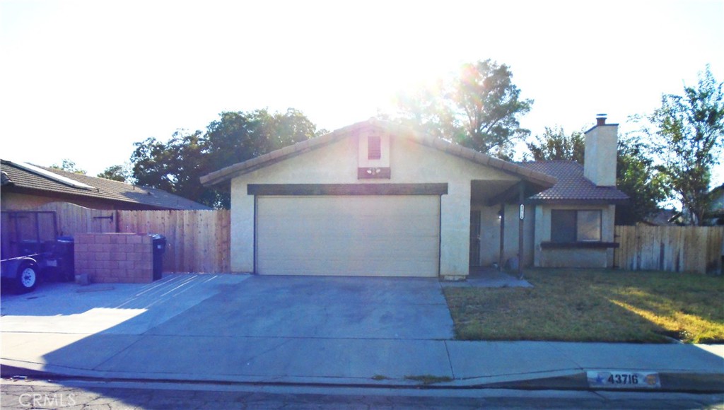 Affordable Fixer-Upper in a good location! Single story home with good curb appeal! Living room with fireplace, efficient kitchen layout with adjoining dining area. 3 bedrooms/ 2 full baths. Interior laundry area. 2 car attached garage. Front driveway offers additional paved parking space. Rear yard has a nice covered patio area. Home is sold AS-IS. Bring your imagination and view this property today!