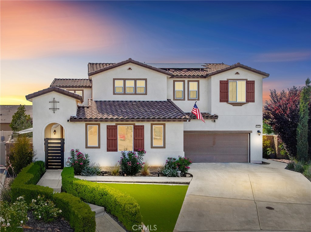 Beautifully upgraded 5-bedroom, 3.5-bath executive home located on a quiet cul-de-sac in highly sought-after Spencer’s Crossing, just minutes from the Oasis Pool. This spacious 3,111 sq ft home features an open-concept kitchen with quartz counters, ceramic stone backsplash, pendant lighting, soft-close drawers, stainless steel appliances, and a vented pyramid cooktop. The great room offers dual 12-foot sliding glass doors and upgraded finishes throughout. Downstairs includes a private bedroom, with glass French doors. Additional upgrades: luxury vinyl plank flooring on the first floor, plantation shutters throughout, upgraded stair railing, and paneled interior doors. The oversized primary suite boasts a walk-in closet, en-suite bath with walk-in tiled shower, dual vanities, and added privacy door. Upstairs includes a spacious loft, 3 secondary bedrooms, and a laundry room with sink and added shelving. Low-maintenance backyard with extended patio cover and a stock tank pool—perfect for summer. Home includes PAID solar, whole-home water softener, and a 3-car garage. Spencer’s Crossing offers pools, parks, walking trails, and top-rated schools. Move-in ready!