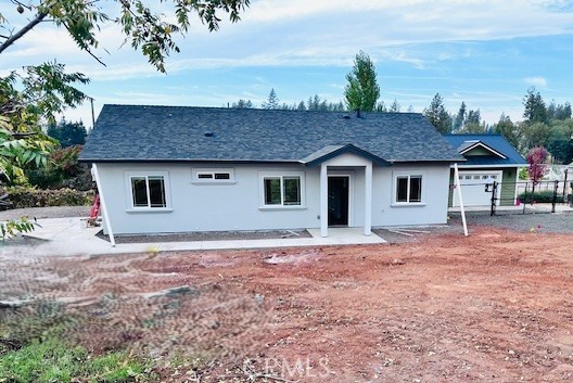Located on a .39 acre lot, this 3 bedroom, 2 bathroom, plus den, Anderson Builders Corp., quality home is scheduled to be completed before the year's end. The kitchen boasts stainless steel appliances, slab granite countertops with a large island, a gas range, stainless steel farmhouse sink, and a microwave above the range.  You have the primary bedroom on one side of the home with its own slider to the backyard, and the other two bedrooms on the other side of the house, with a distance from the family room to make sure there is peace and quiet when needed.  The floors are luxury vinyl plank flooring throughout with mini-blind window coverings, upgraded closet packages, insulated interior walls between the bedrooms and bathrooms, mini-split heating and air conditioning systems, inside laundry closet and RV hookups on the side of the home.  With the .39 acre lot, per the builder, there is enough room to potentially add a detached garage or shop after close of escrow.  The home includes fire sprinklers, 4KW solar panels (owned), and an energy-efficient electric hot water heater to keep your utility costs down.  The seller is only considering owner-occupied buyers.  Seller/builder is providing a 1 year fit & finish warranty and a $2,500 CREDIT TO BUYER @ CLOSING.  Call your favorite Realtor today for a viewing.