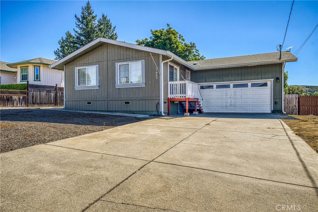 Located in the gated community of Hidden Valley Lake, this updated 3-bedroom, 2-bathroom home offers 1,248 square feet of comfortable living space on a generous 1/3-acre lot. Remodeled in 2018, the kitchen features granite countertops, white cabinetry, stainless steel appliances, and a tasteful backsplash. The interior is bright and welcoming, and the backyard provides a peaceful retreat that backs to open space—perfect for relaxing, gardening, or entertaining. A drive through gated side yard with gravel pad offers convenient storage for your boat, RV, golf cart, or other outdoor gear. As part of Hidden Valley Lake community, you’ll enjoy access to amenities like a private lake with beaches, championship golf course, playgrounds, swimming pool, tennis courts, and scenic walking trails—bringing comfort, recreation, and nature together in one place.