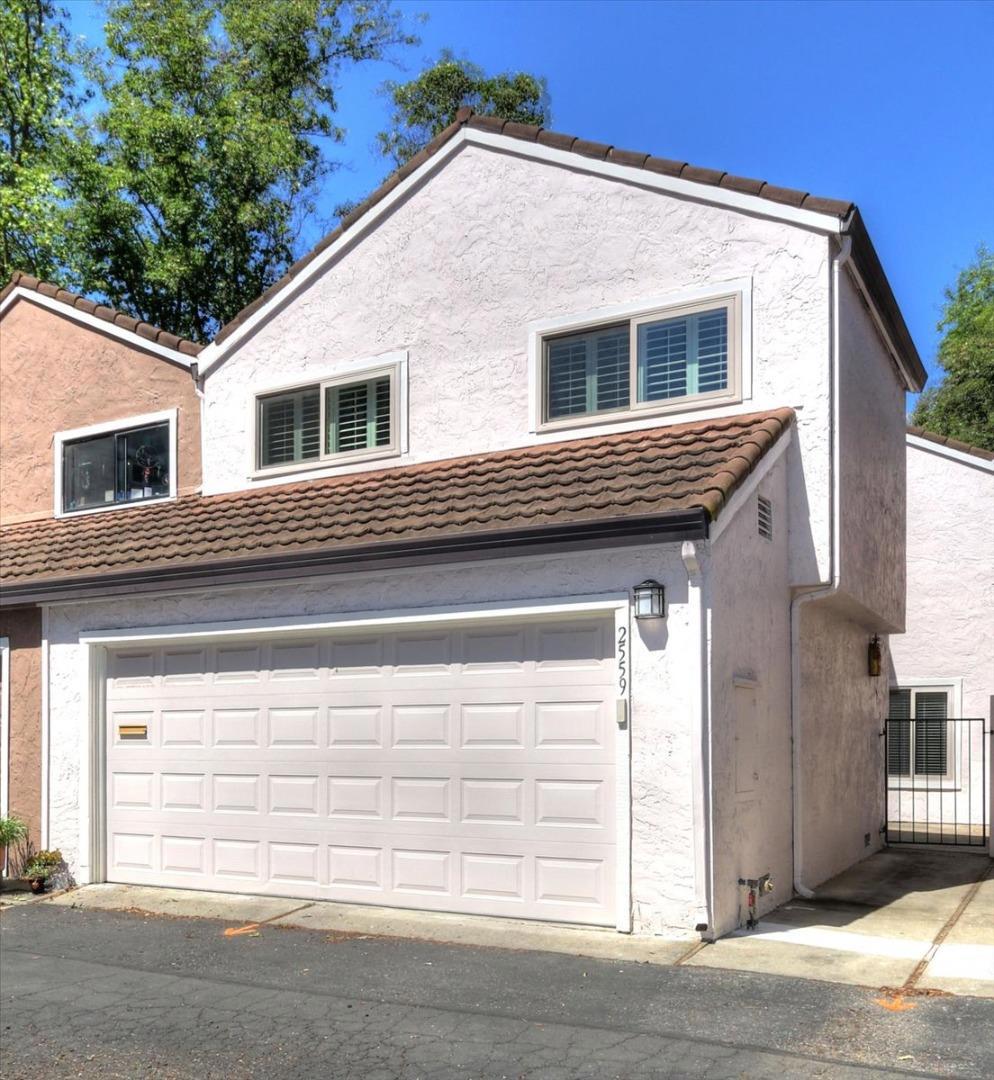 Welcome to this charming 3-bedroom, 2-bathroom home in the heart of Santa Clara. Spanning 1,311 sq ft, this residence boasts a well-appointed kitchen complete with granite countertops, a dishwasher, garbage disposal, hood over range, microwave, oven range - gas, and refrigerator. The kitchen is equipped with a 220 Volt Outlet, making it both functional and modern. The interior features a combination of carpet, tile, and wood flooring, complementing high ceilings that add to the sense of space. For convenience, laundry facilities with an electricity hookup (220V) are located in the garage. Enjoy cozy evenings by the fireplace in the living area. The property is situated in the Santa Clara Unified School District, offering access to local schools. Additional amenities include a community pool, fenced and in-ground, perfect for relaxation and recreation. The home also features a two-car garage with an Electric Vehicle Hookup Level 1 (120 volts), catering to eco-conscious homeowners. Experience comfortable living in this desirable Santa Clara Townhouse.