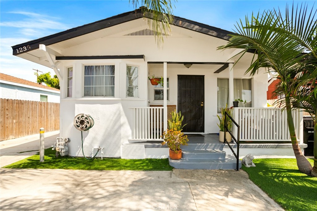 Pride of ownership - First unit is a 3 bedroom, 2 bath. Second unit is a two bedroom, 2 bath. Plus a converted garage without permits.