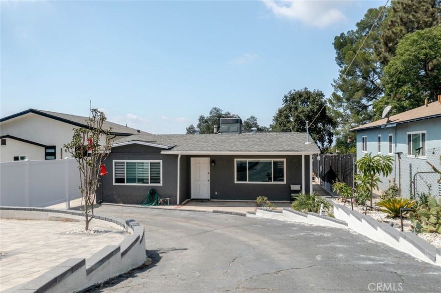 Your search is over, check out this cozy 848 sq ft residence, part of a well-maintained triplex! This charming home features beautifully updated appliances and a stunning kitchen complete with a marble-detailed island—perfect for cooking and entertaining. Enjoy laminate flooring throughout, spacious bedrooms with ceiling fans, and thoughtful upgrades that blend comfort and style. Located in the desirable Tujunga neighborhood, this home offers convenience, charm, and modern living all in one. All utilities are included in the rent, giving you one less thing to worry about each month! Don't miss out on this rare gem!
