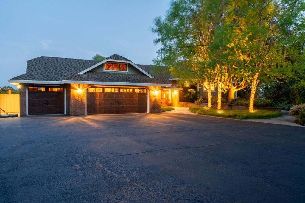 Welcome to Old Stone Ranch Where Equestrian Dreams Come True Ideally located at the end of a peaceful cul-de-sac, this stunning home offers the perfect blend of country charm and refined living, just minutes from town. A gated entrance welcomes you to beautifully landscaped grounds, a sweeping driveway, and a grand entryway that sets the tone for the graceful estate inside. Step inside to discover soaring ceilings with wood-beamed coffered accents, sun-drenched living spaces, and quality finishes throughout. All bedrooms are generously sized, with the Primary Suite featuring French doors that open to a private balcony the perfect spot to enjoy breathtaking sunrises and sunsets. Equestrians will appreciate the fully equipped 3-stall barn, 2 stall loafing shed, tack room, hay storage, sanded riding arena, plus a horse pasture. With Coyote Lake-Harvey Bear Ranch County Park horse trails just minutes away, this property offers the ideal setting for both peaceful living and an active equestrian lifestyle.
