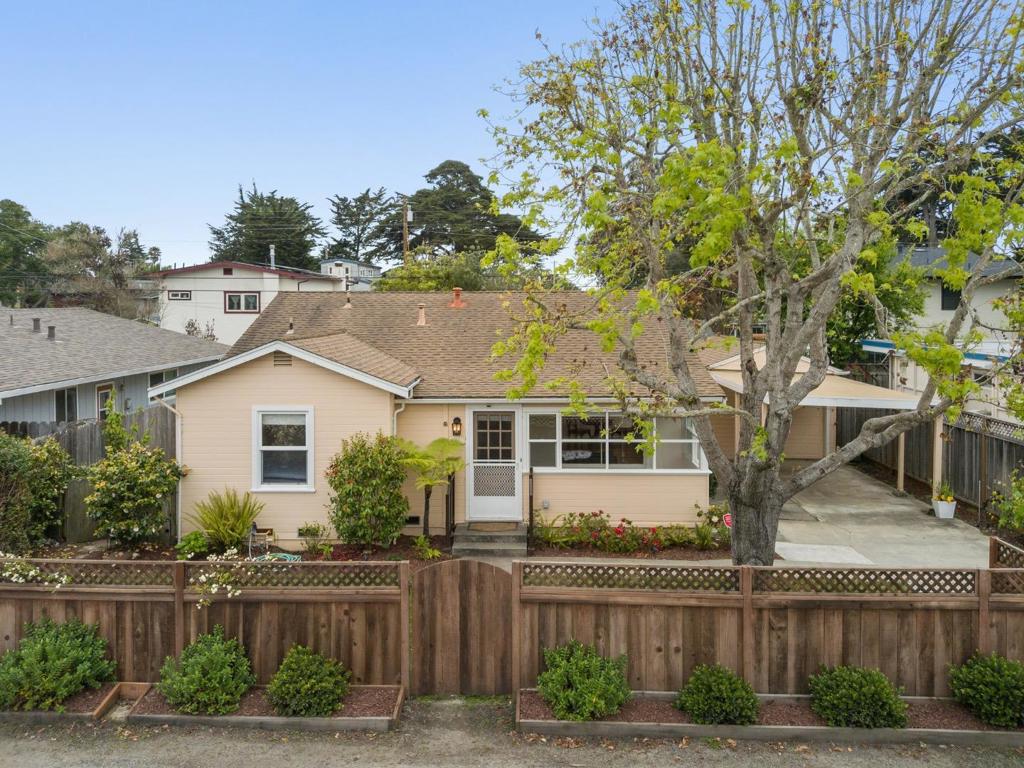 Quintessential beach cottage just a hop, skip & jump from Seacliff State Beach, Marianne's Ice Cream, Manuel's, groceries and more! Located on a spacious and sunny lot, this Seacliff charmer welcomes you home to the beach life you've been dreaming of. Single level floor plan with real oak wood floors and loads of charm. Updated kitchen appliances and a recently remodeled bathroom provide modern amenities to make life a breeze. Two generous bedrooms, a large living room, dedicated laundry/mud room and bonus space of enclosed sun room provides room for home office or playroom. While the interior offers a classic beach house vibe, the enchanting outdoors will be sure to please. Plentiful yard space helps make your garden grow, with multiple raised garden beds ready for your herbs and veggies. Fully fenced for privacy and relaxation, creating a perfect space for year round entertaining. Detached 1.5 car garage, with additional driveway parking behind your gated fence. With a premier location and undeniable charm, make this hidden gem your own private oasis!