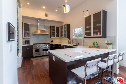 Photo of 1857 N Beverly Drive, Beverly Hills, CA 90210 (MLS # 26639521)