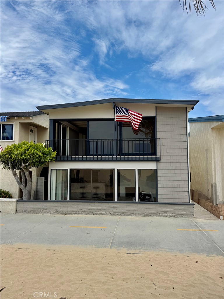 This exceptional three-unit beach house offers the ultimate coastal lifestyle, featuring two front units (3-bed/2-bath and 2-bed/2-bath) and a private rear unit (1-bed/1-bath), all thoughtfully designed for comfort and functionality. Highlights include a rooftop deck perfect for entertaining, a welcoming boardwalk patio and porch, and a rare three-car garage, combining practicality with stunning aesthetics. Perfectly situated along the boardwalk, this property is just steps from Marine Park, the iconic American Legion Post 291, and within walking distance to Newport Elementary, offering unmatched convenience and leisure. Don’t miss this rare opportunity to own a piece of beachfront paradise.