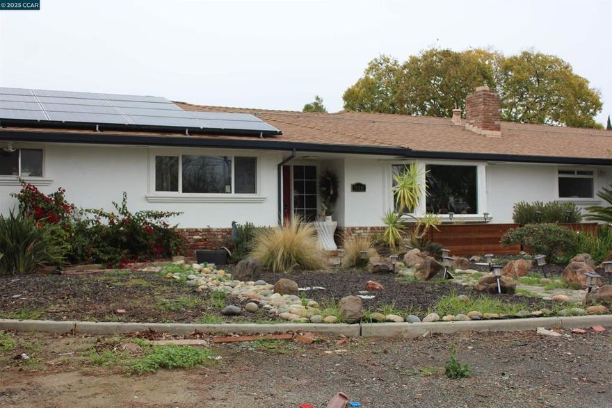 Ready to move-in this beautiful 3-bedroom 2 baths home with One of the bathrooms completely new. Partial new paint inside, tiled counters top, breakfast bar, family room, custom brick fireplace in the living room, lot of storages, spacious 2 car garage, a beautiful big back yard with a lot of fruit trees. Lemon trees, Grapefruit trees, orange tree, grapes and lots of side yard, a nice front yard with RV parking available. and a lot of parking space.