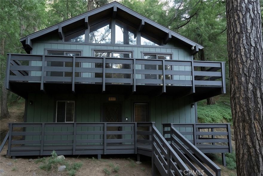 Discover the perfect blend of rustic charm and modern comfort in this beautifully upgraded Swiss Chalet-style cabin, nestled in the serene mountain town of Crestline, CA. Whether you're dreaming of a peaceful full-time mountain escape or looking for a turnkey, fully furnished Airbnb investment, this 2-bedroom, 2-bath home is an opportunity you won’t want to miss.



Thoughtfully updated throughout, this enchanting retreat features fresh interior and exterior paint, new flooring, stylish lighting fixtures, a brand-new wraparound deck, and a gently lit stairway that welcomes you home with warmth and charm. Step inside to be greeted by vaulted tongue-and-groove ceilings and striking floor-to-ceiling windows that fill the space with natural light and showcase the forested beauty just outside your door.



The heart of the home is a cozy living space complete with a stone gas fireplace—perfect for relaxing evenings. The upgraded kitchen boasts beautiful butcher block countertops, ideal for cooking up memories with family or entertaining Airbnb guests. Step out onto the spacious balcony, where the peaceful energy of Mother Nature surrounds you—a perfect place to enjoy your morning coffee or unwind with a good book.



Located just a short stroll to downtown Crestline and a quick drive to the tranquil waters of Lake Gregory, you’re also conveniently close to Lake Arrowhead and Big Bear for year-round recreation—from hiking and fishing to snowboarding and skiing.



Smart home features and keyless entry make managing the home or your guests a breeze. Whether you're seeking solitude, a stylish mountain residence, or a high-demand vacation rental, this Crestline gem offers it all: comfort, convenience, and the magic of mountain living.