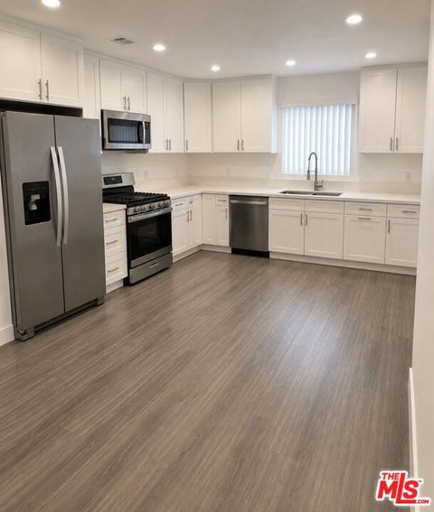 Photo of 1145 S Holt Avenue #11, Los Angeles, CA 90035 (MLS # 26882919)