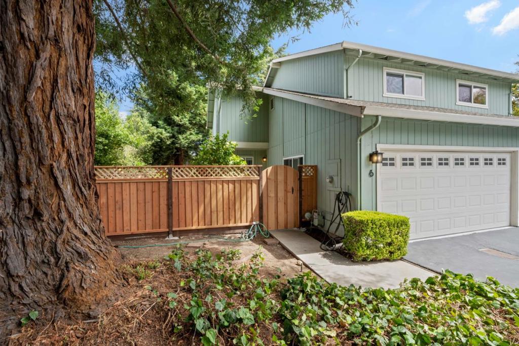 Welcome to this move-in ready spacious end-unit townhome offering comfortable living across two levels! The main floor features a living room with a functional kitchen and a welcoming patio and side yard perfect for outdoor entertaining. Upstairs, the primary suite offers a walk-in closet, private balcony, and a nicely updated bathroom. Two additional bedrooms share a full bath, providing flexibility for family, guests, or a home office. Attached 2-car garage with epoxy flooring, laundry area, and extra storage. All the termite work is complete, and a new fence has been installed. Surrounded by mature trees, the home enjoys added privacy and a serene, peaceful setting. Located blocks from vibrant Downtown Mountain View with its shops, restaurants, and performing arts center. Kids can walk or bike to highly rated Bubb Elementary and Graham Middle schools or drive to Mountain View High School. Easy access to El Camino Real yet tucked away in a quiet and relaxing setting. Minutes to HWYs 85, 101, and 237 for an easy commute to all major employers. Don't miss this rare opportunity to own a well-maintained home in one of Mountain View's most desirable locations! Make an appointment, see it yourself, fall in love, and make it your own!