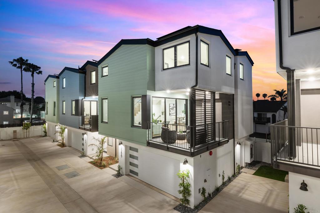 Brand-New Beach Townhome Just One Block from the Ocean, Move-in Ready Now! *Builder is offering a generous rate buydown incentive. Special financing options available to qualified buyers.* Welcome to 3586 Garfield Street, an exceptional three-story townhome located in one of Carlsbad’s premier beachside neighborhoods—just steps from the sand and a short stroll to Carlsbad Village. This newly built Twelve West residence offers 2,156 sq. ft. of thoughtfully designed living space, featuring 3 bedrooms, a bonus room/home office on the first floor, and 2 full + 2 half bathrooms. Enjoy the seamless flow of indoor-outdoor coastal living with a large deck off the great room and a private, fenced backyard. Crafted for modern coastal living, this home showcases European oak wood flooring throughout, owned solar panels, smart home features, and a direct-access 2-car garage with an epoxy-coated floor. The chef’s kitchen is a standout, equipped with premium Wolf and SubZero appliances, including a 36” dual fuel, 6-burner gas range, microwave drawer, built-in SubZero refrigerator, and separate wine fridge. Timeless quartz countertops, a waterfall-edge island, soft-close shaker cabinetry in white and grey, designer tile, matte black hardware, and premium Kohler fixtures elevate the space. The great room opens to a generous deck through stacking Western glass doors, plumbed for a BBQ and fitted with Terra Summer Lumina privacy shutters—perfect for entertaining. Upstairs, the primary suite boasts vaulted ceilings, custom built-ins, a large walk-in closet, and a spa-inspired bathroom with a luxurious shower and upscale finishes. Two additional bedrooms and a laundry area complete the third floor. The sun-drenched south-facing yard offers a blank canvas for your personal touch. Additional highlights include pre-wired speaker locations, pre-wiring for future Ring doorbell and security cameras + abundant storage throughout. Twelve West is a boutique coastal community just a block from the beach and moments from downtown Carlsbad Village, offering easy access to shops, dining, parks, and walking trails. Each home is designed to capture the essence of contemporary beachside living with light-filled interiors, private yards, breezy decks, and elegantly curated finishes by an award-winning design team. Don’t miss your chance to own a slice of paradise and live the ultimate Southern California coastal lifestyle at Twelve West.