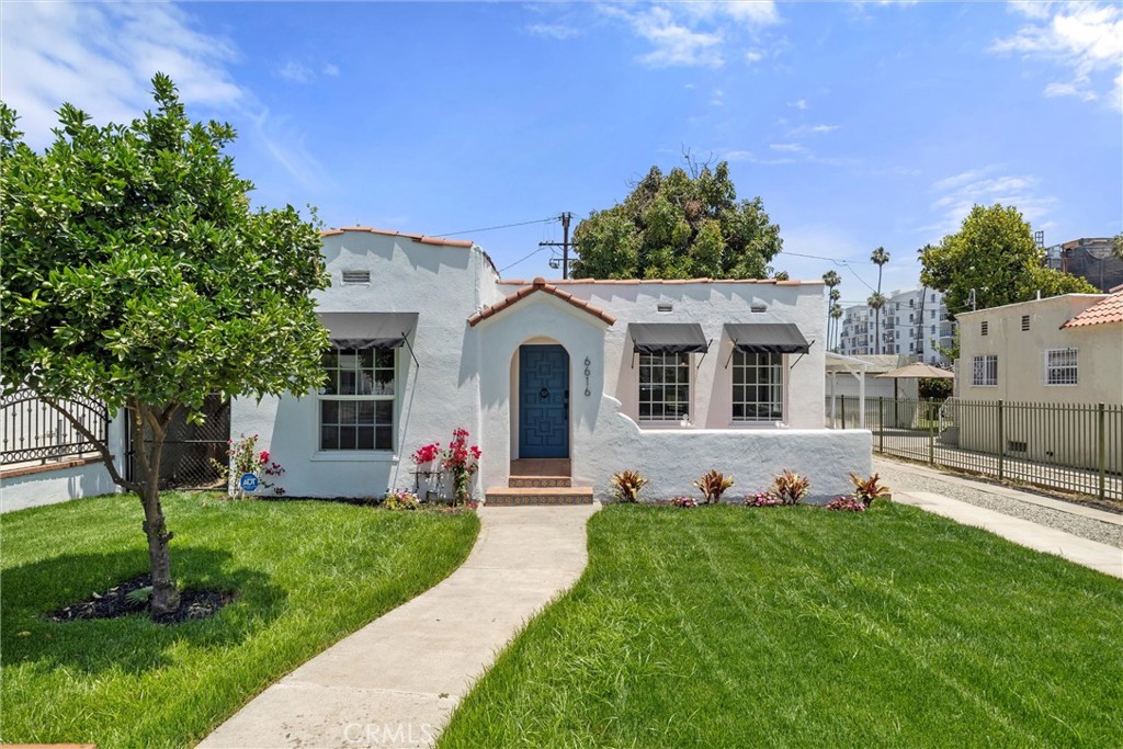 Welcome to 6616 & 6614 Vesper Ave, an exquisite Spanish-style multi-unit property nestled in the historic district of Van Nuys. Thoughtfully restored with modern Old-World Spanish charm, this unique 2 unit property of 4 bedrooms, 3 bathrooms, and approximately 1,651 sq ft of combined living space — ideal for multi-generational living, investment, or income potential.
Step inside the front main residence 6616 Vesper Ave (1,301 sq ft) and be greeted by arched entryways, fully remodeled bathrooms, kitchen, and exterior wrought-iron accents, accenting the home’s Spanish heritage. The open-concept living room is flooded with natural light.
The updated kitchen seamlessly blends modern Spanish charm with functionality, featuring handcrafted-style tile backsplash, sleek countertops, open shelving, and brand-new stainless-steel appliances — perfect for both everyday living and entertainment.
Detached from the main home is 6614 Vesper Ave, permitted 350 sq ft ADU, echoing the same Spanish flair and its own private entrance — perfect for guests, extended family, or rental income.
Outside, the long gated driveway accommodates multiple vehicles or even an RV, leading to a charming covered carport. The fully fenced property offers both privacy and curb appeal.
A perfect blend of historic Spanish elegance and modern upgrades, this property is a rare gem—offering two homes for the price of one.
Move-in ready and available for a fast closing — don’t miss this one-of-a-kind opportunity!