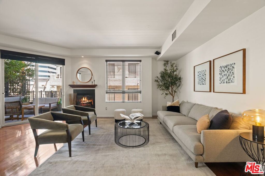 This spacious 2 bedroom, 2 bathroom residence offers 1,358 square feet of modern West LA living with resort-style amenities. The bright, open living area features a fireplace, central heat and air, and a large corner balcony perfect for indoor-outdoor entertaining. The upgraded kitchen boasts sleek new quartz countertops, stainless steel appliances, and ample storage. The expansive primary suite includes its own fireplace, walk-in closet, and a spa-inspired bath with dual vanities, soaking tub, and glass-enclosed shower. Additional highlights include side-by-side in-unit laundry, a private locked storage room, and 2-car tandem parking with access to 23 guest spaces. Wilshire Borgata offers unmatched convenience with doorman service five days a week (8am to 3pm), pool, spa, gym, meeting room, and a community lounge. Ideally located a few blocks from Ralphs and just minutes to UCLA, Westwood Village, Brentwood's shops and dining, and Santa Monica beaches. Don't miss this rare opportunity to own a beautifully updated home in one of the Westside's most desirable locations!