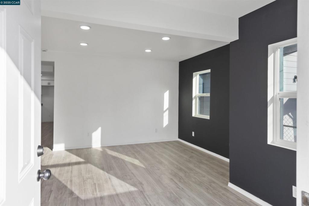Move In Ready! Discover this fully remodeled home that seamlessly blends modern comfort with versatile living options! Close commute to main locations and freeways like Richmond Ferry, Richmond Parkway and 580 freeway. This property has been thoughtfully transformed into a spacious 3-bedroom, 1-bathroom main residence, complete with a potential in-law unit offering an additional 2 bedrooms and 1 bathroom—Step inside the main house and be greeted by brand-new laminate flooring that flows throughout, creating a warm and inviting atmosphere. The heart of the home is the fully remodeled kitchen, boasting sleek countertops, contemporary cabinetry, and state-of-the-art appliances that make cooking a delight. Stay cool during those warm days with a newly installed in-wall air conditioner, ensuring year-round comfort.The flexible in-law unit expands your possibilities endlessly. Move In Ready!