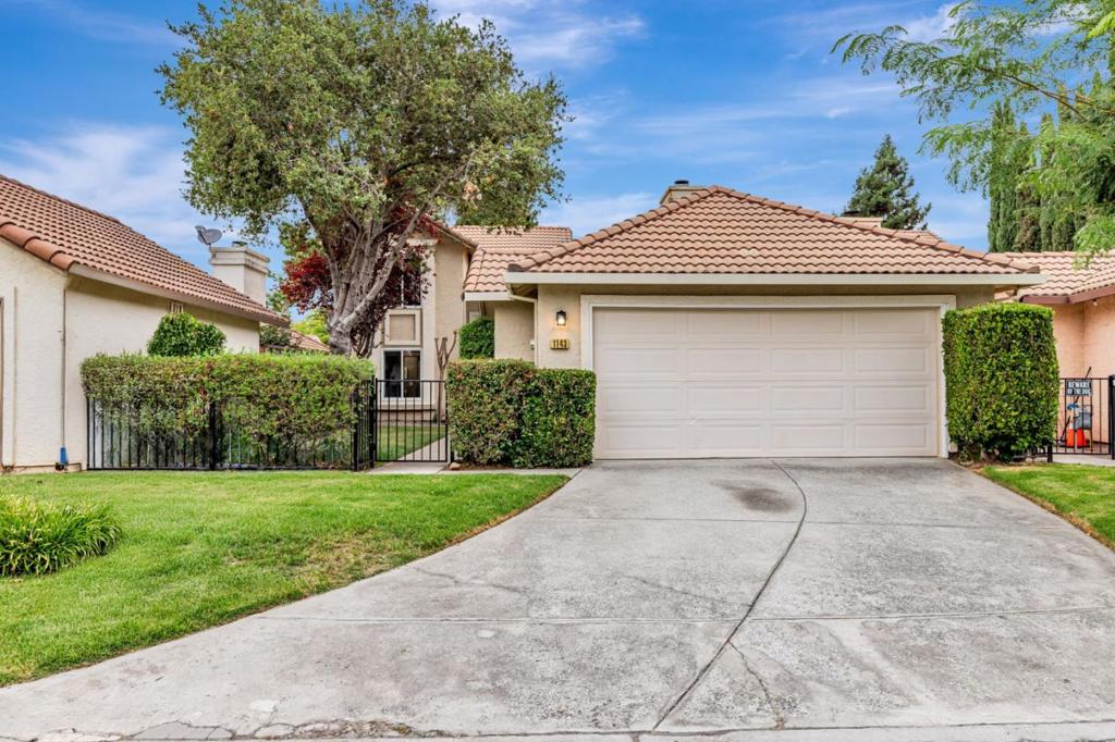 Welcome to this 3 bedroom 2 bathroom home in one of Gilroy's most desirable neighborhoods just a 3-minute walk to Luigi Aprea Elementary and close to Christopher High. Inside, enjoy an airy, open layout with vaulted ceilings and large energy-efficient windows that fill the living room with natural light, where a wood-burning fireplace adds warmth and charm. The spacious ground-floor Master suite offers a peaceful retreat, complete with walk-in closet and en-suite bath. Upstairs features two bedrooms and a full bath perfect for kids, guests, or a home office. The kitchen includes a gas range, a large pantry, and a separate laundry area for added convenience. Step outside to your private backyard oasis, featuring a shaded wood deck ideal for outdoor dining or quiet relaxation. A detached garage adds versatility and storage. With all of this and more, this home is the perfect blend of comfort, location, and lifestyle don't miss your chance to make it yours!