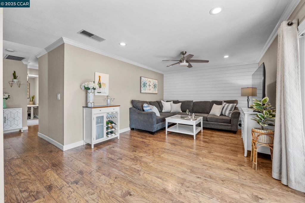 Welcome to this beautifully updated upstairs unit featuring 2 spacious bedrooms and 1 full bathroom. Inside you’ll find an open layout with tons of natural sunlight, beautiful hardwood floors and elegant crown molding throughout. The freshly remodeled bathroom adds a touch of luxury, while the in-unit laundry offers ultimate convenience. Both bedrooms include Elfa closet organizers, maximizing storage and functionality. Enjoy your morning coffee on the private balcony with peaceful views of the well-maintained grounds. This is one of the few units in the complex that offers this unique, serene outlook! Or take in the stunning view of Mt. Diablo right from your front door. Conveniently located close to BART, this home is perfect for commuters or anyone seeking easy access to other parts of the Bay Area. It's also just around the corner from Oak Grove and Countrywood shopping centers, offering a variety of grocery stores, restaurants, coffee shops, and retail options. With ample guest parking and thoughtful interior touches, this home blends comfort, style, and convenience in one perfect package. Don’t miss out - schedule your tour today!