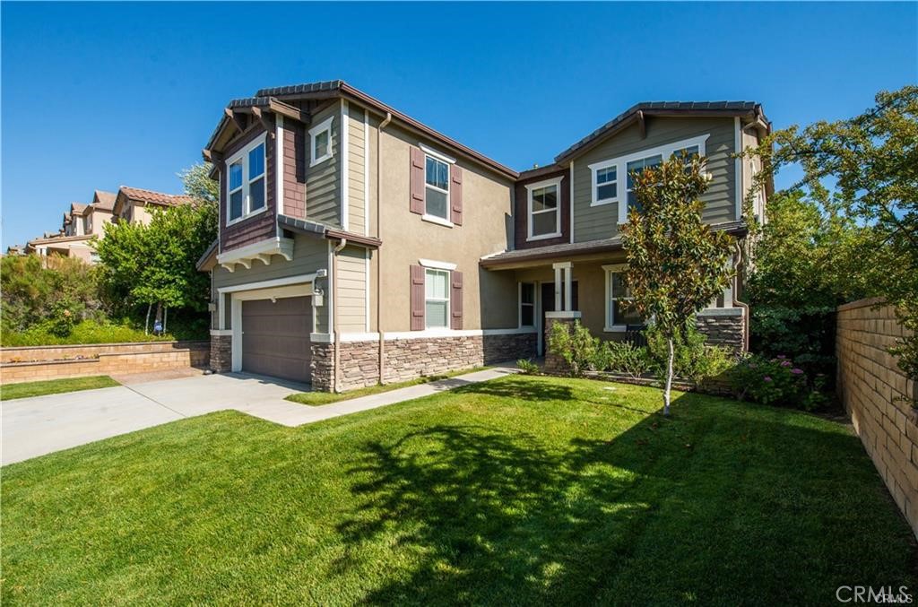 Discover the perfect blend of space, comfort, and Southern California charm in this stunning 6 bedroom, 3-bath custom-built home, boasting right under 3,600 square feet of beautifully designed living space. Located in the sunny town of Saugus, this expansive property offers ample room for both family living and entertaining, with spacious bedrooms, open-concept living areas, and thoughtfully crafted finishes throughout. From the minute you walk through the double entry doors, to enjoying the stainless steel appliances within the magnificent gourmet chef's dream kitchen, to the many bedrooms upstairs to choose from, this home has it all! Enjoy the lifestyle that comes with living in the heart of Santa Clarita—one of SoCal’s most sought-after communities. From award-winning schools and scenic hiking trails to nearby shopping, dining, and easy access to major freeways, this home offers more than just a place to live—it’s a gateway to everything that makes Southern California living exceptional.