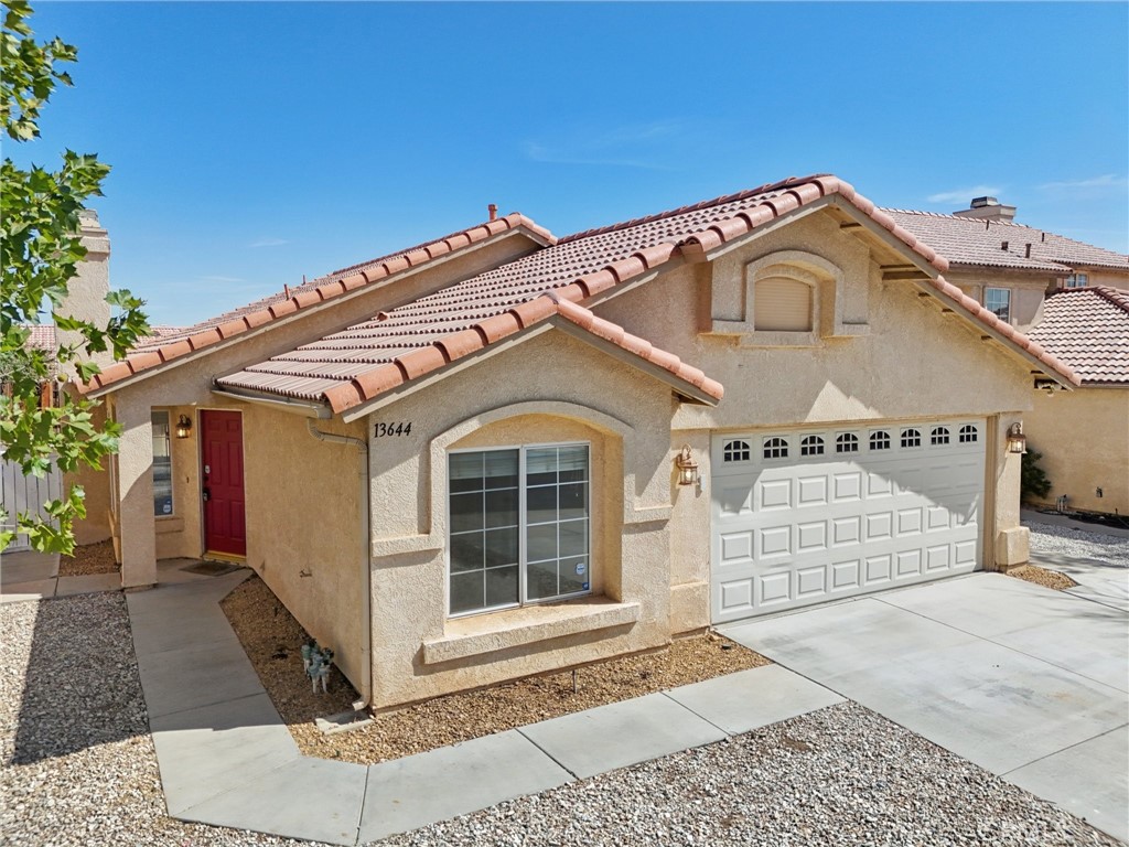 Welcome to this charming 3 bedroom, 2 bathroom home located in the desirable Foxfire Ranch community of Victorville. Offering 1,104 sq ft of comfortable living space, this home is clean, well maintained, and truly move-in ready.
Step inside to find a cozy fireplace in the living room and an indoor laundry room for added convenience. The kitchen features elegant granite countertops and Spanish tile flooring, combining style with function.
The exterior is equally inviting with beautifully landscaped front and back yards. Enjoy High Desert evenings or weekend gatherings under the large covered patio, complete with three ceiling fans and a outdoor TV Mount, perfect for an additional entertaining feature. A good-sized yard offers plenty of room for BBQs, play, or relaxation.
Built in 1992, this home also includes a 2-car attached garage and is commuter-friendly with easy access to nearby shopping, parks, and schools, including Liberty Elementary and the highly sought-after Discovery School of the Arts.
Don’t miss this wonderful opportunity to own a move-in ready home in one of Victorville’s well-known neighborhoods!