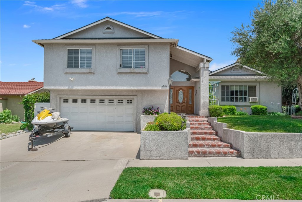 Beautiful private home with a spectacular pool, spa and mountain views! This home has five spacious bedrooms, a loft or office space and a large bonus room with one main level bedroom. This home is great for a large family with a lot of separation and space throughout the home. There is a primary suite with a full bathroom and views of the pool and mountains. The roof, air conditioner, double pane windows, plumbing, newer pool pump and refinished pool plaster had all been upgraded. The backyard with the pool, spa and built-in BBQ is an amazing place to hangout and entertain with family and friends. The two car garage is spacious and there is plenty of space in the driveway for multiple vehicles as well. This home is located in a highly sought after neighborhood with convenient proximity to the 57 and 60 Fwy. Call today to schedule a private showing!