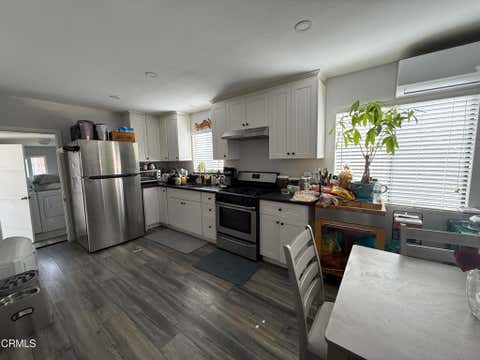 Photo of 301 W Adams Avenue, Alhambra, CA 91801 (MLS # P1-28493)