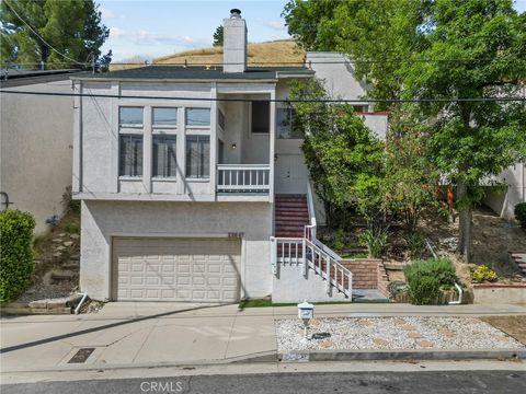 Photo of 22647 Margarita Dr, Woodland Hills, CA 91364 (MLS # SR26078728)