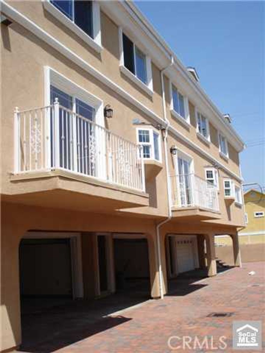 Beautiful townhouse style Condo in a gated community. (unit 102) Wood flooring throughout. Custom kitchen with top of the line granite counter tops and stainless steel appliances including refrigerator. Very spacious living room with fireplace, master bedroom with fireplace, sky light, energy saving feature, washer and dryer hook ups in garage, recessed lighting throughout, 2 car attached garage with automatic door openers, and much much more!!! Must See unit #104