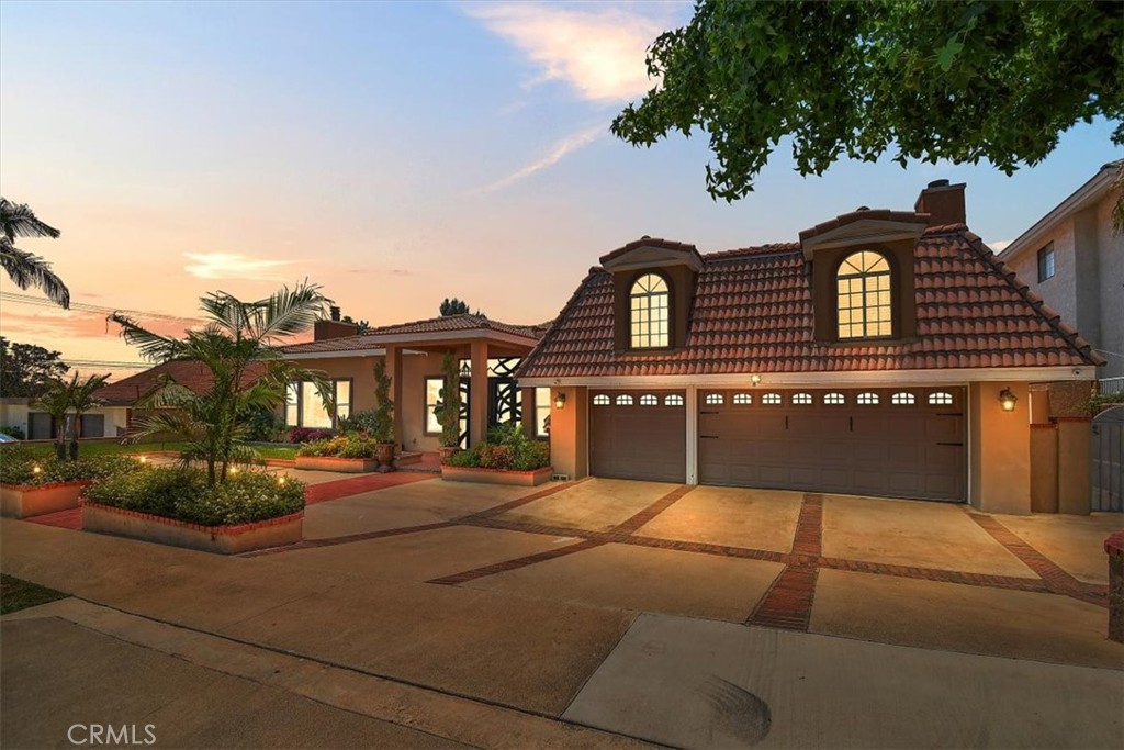 Breaking News! Welcome to 2335 San Antonio Ave, Upland, CA, an exceptional San Antonio Heights Custom Designed Home for those who live boldly and entertain lavishly. This 5,120 sq ft residence offers 5 bedrooms, 3 full baths and 2 half bathrooms, 17,500 sq ft lot. As you enter the home through towering wrought iron doors your greeted with a relaxing view of the atrium. Upon entering, the soothing sound of a gentle cascade immediately calms the spirit. At the heart of the home lies a chef's gourmet kitchen you want to write home about featuring sleek quartz countertop with oversized island and full sitting area. Ample counter space for your prep work, premier stainless-steel appliance, wine frig, newer modern cabinetry and pantry. But there is more, the open concept layout flows effortlessly into the family room from your chef's kitchen featuring high ceilings, almost full length Accordian Doors that seamlessly connect to the private oasis backyard pool and spa for year-round entertainment. Off the family room, French doors that extend to creates a sense of spaciousness, relaxation, and a focal point in the atrium. Truly an entertaining home with a living room thar features plenty of space for a formal sitting area, game room area, and coffee station. Your backyard Oasis features pool with grotto, and a spa is a luxurious and unique water feature combining relaxation with a natural cave-like element. Grand patio cover and plenty of space for barbeque enjoyment. The primary bedroom features a relaxing view of back yard, & a large walk-in closet. Primary bathroom offers amazing sky windows for natural lighting, custom tiled walk-in shower, and freestanding bathtub. Second Primary room with grand marble veneer/mantel fireplace, custom cabinetry, doorless entry shower and tub, custom closet cabinetry and small patio area. Loft like bedroom with a staircase up to second level with study area and walk-in closet. Garage is converted to living space with kitchen/bathroom/living space, great for multi-generation. Other features include recess lighting, Updated wood laminate flooring, entertainment center with fireplace and veneered dry-stack, dual AC units, updated dual pane windows, Fruit trees and much more. Don't Miss Out On This One! Note, per title shows 4350sqft, room addition above garage is 770 per seller.