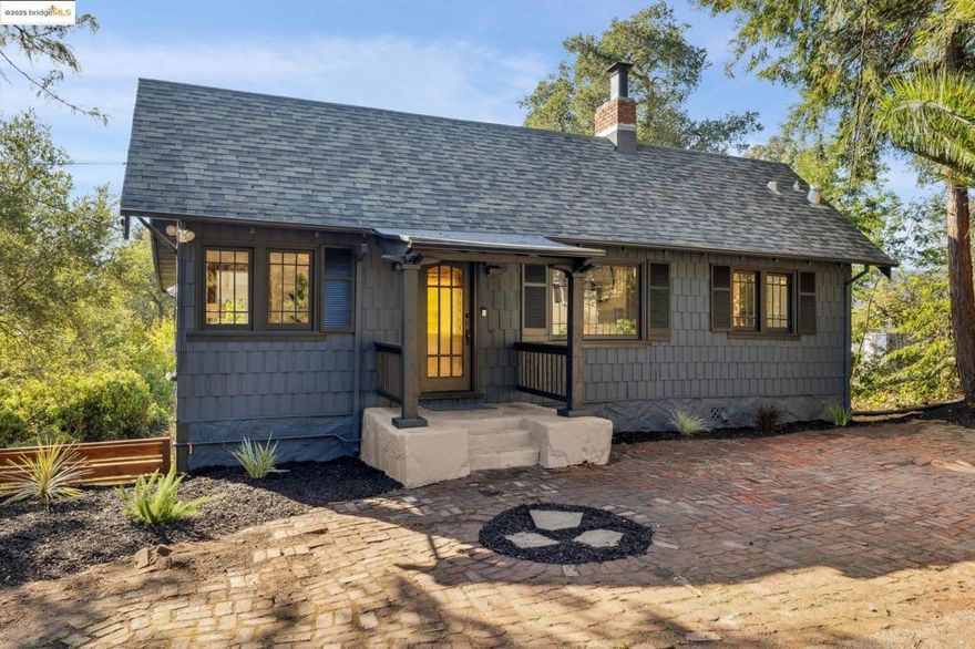 Nestled in a serene hillside, this rare Lincoln Heights gem offers unmatched privacy amid lush greenery & mature trees. The expansive lot presents endless possibilities, from creating your dream retreat to exploring SB9 & development opportunities. The charming two-story home features 1Bd/1Ba, filled with natural light & timeless character. The open-concept living room showcases hardwood floors, colonial grid windows & a cozy fireplace. Victorian-era glass pocket doors open to the formal dining room with built-ins & tranquil views, perfect for dinner parties or intimate gatherings. Downstairs, discover a hidden sanctuary with a kitchen that highlights Early American craftsmanship, hand-hewn beams & a cozy breakfast nook ideal for morning coffee & birdsong. The property also includes an attached garage, full-size washer/dryer & two Tuff-Sheds for storage. Outdoors, the expansive lot feels like your own private park, ideal for gardening, or potential expansion. Whether you envision building your dream home, ADU, or pursuing an SB9 lot split, this property offers exceptional flexibility, subject to local permit & planning. Minutes from Joaquin Regional Park, Robert Regional Recreation Area, Hwy 13 & Montclair Village, experience peaceful hillside living with city convenience.