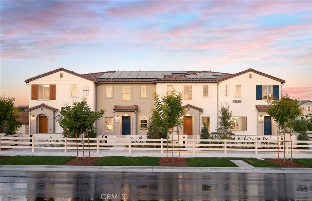 Enjoy sophisticated living in this two-story Plan 1 home at Clover in Wildflower Acres, featuring 2 bedrooms (both suites), flexible space, modern design, and a prime location in the heart of Ontario.
-Satin white cabinets
-Granite countertops at kitchen
-White marble countertops at bathrooms
-Cabinet vanity at powder room
-Craftsman elevation/exterior style
-Standard flooring - linoleum and carpet